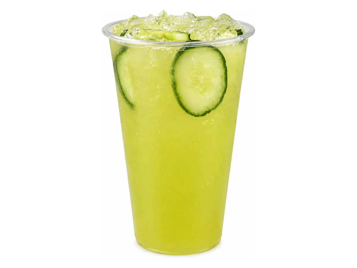 Cucumber Lemonade Refresher, a caffeine-free green drink with cucumber slices over ice