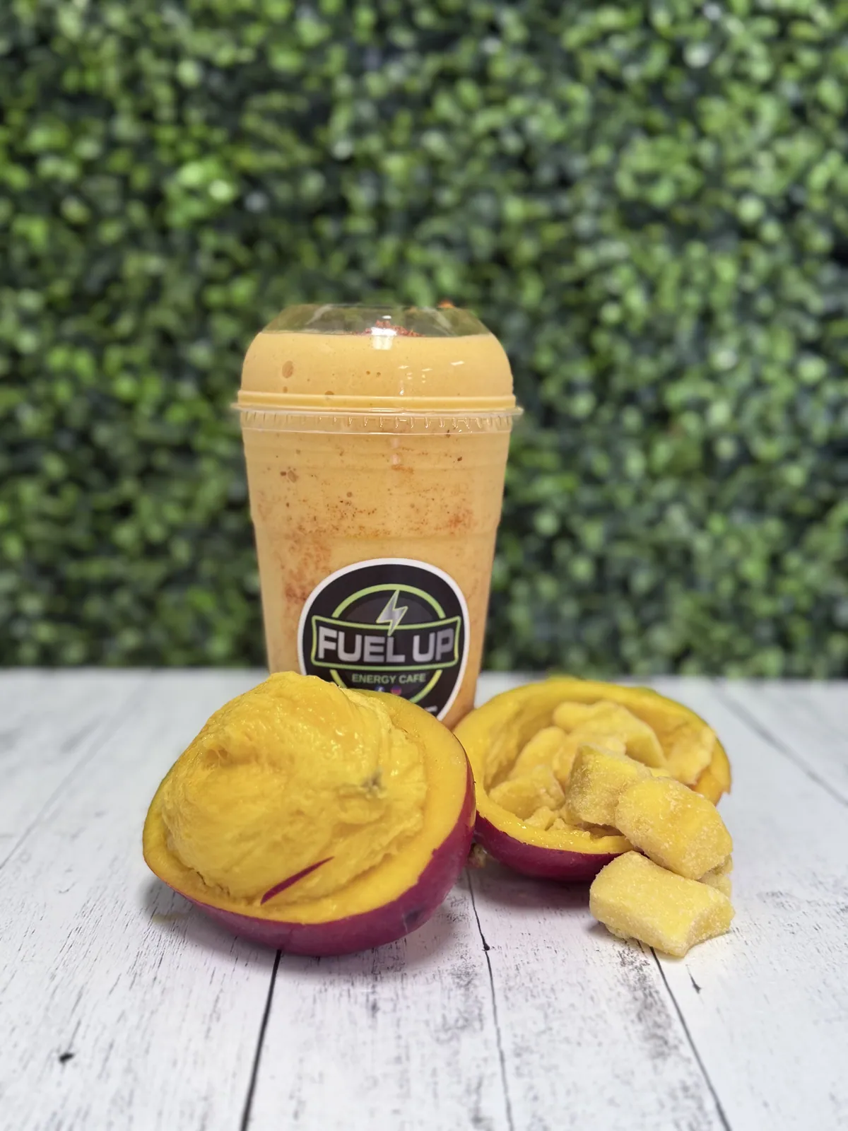 Mango Pineapple protein smoothie styled with fresh mango