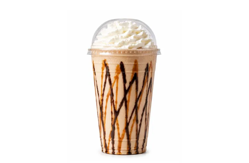 Reese's Cup protein shake with chocolate and peanut butter drizzle and whipped topping, a 24g-protein meal replacement shake at Fuel Up Energy Cafe in Bolingbrook, IL